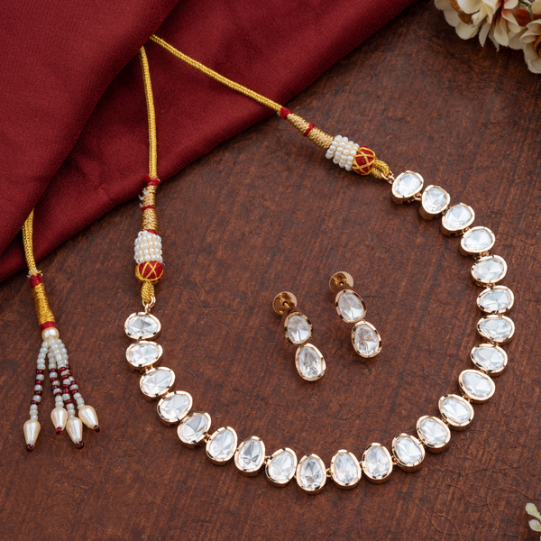 Ameerah; Brass Kundan jewellery set, Oval stones with Carat plating for subtle sparkle