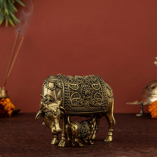 Brass Gau Mata with Calf – Intricately Carved Cow Idol with Floral Motifs & Bent Head Design